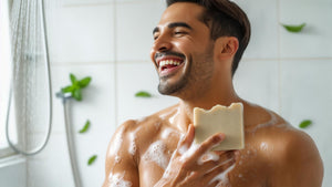 man laughing in the shower with BumZap soap